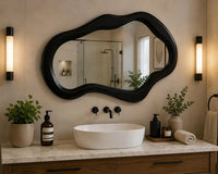 Artisan crafted organic shaped wall mirror for living room display