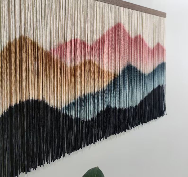 Boho wedding backdrop featuring handmade macrame dip dye art